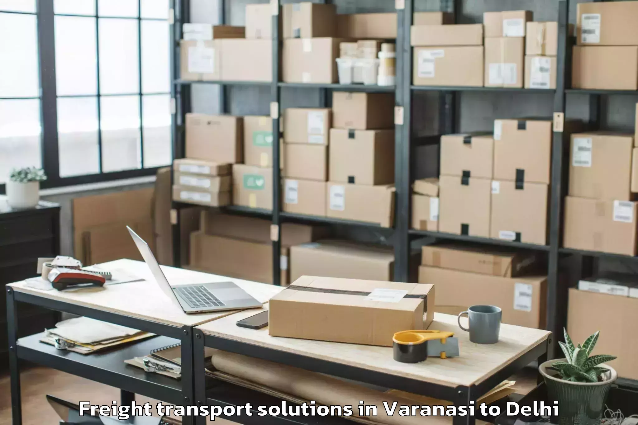 Book Varanasi to Dlf Promenade Mall Freight Transport Solutions Online